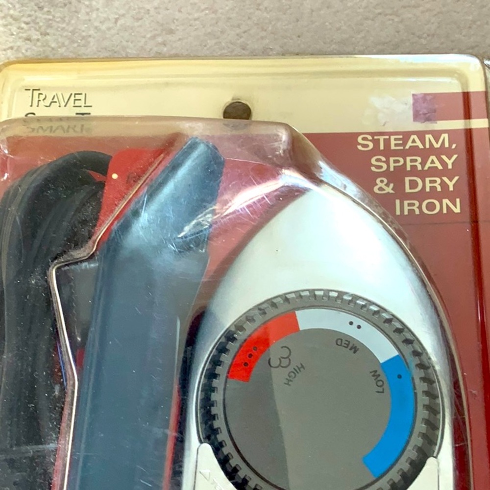 New in package. Travel Smart Steam, Spray, Dry travel iron.